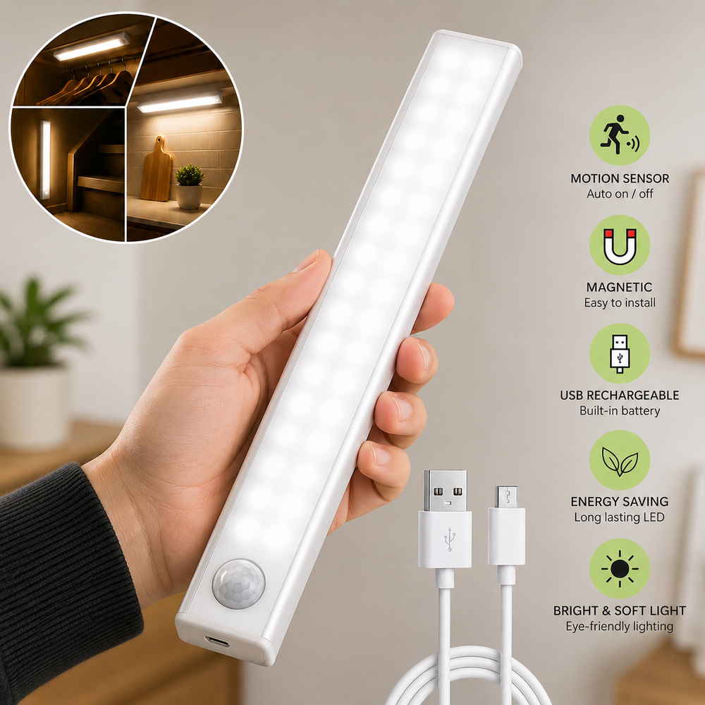 Wireless motion sensor cabinet light held in hand